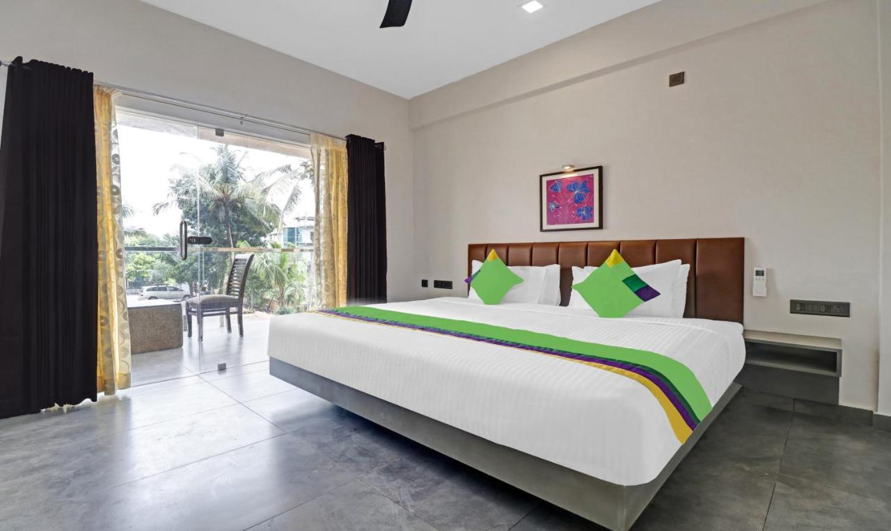 Treebo Grand Vistara Airport Suites Kochi Exterior photo